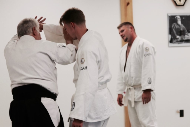 Sensei Mike teaching a student aikido