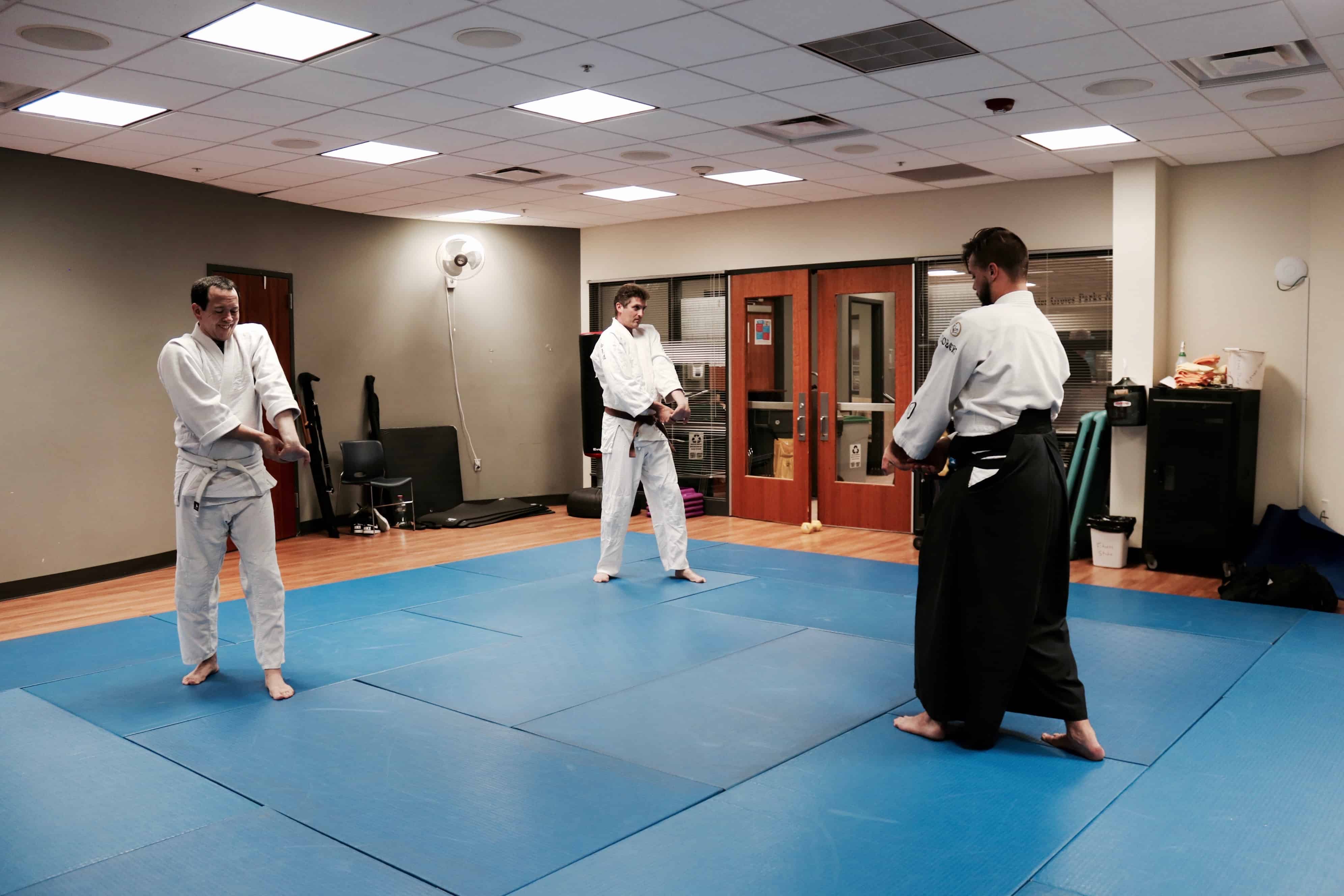 Students studying aikido at Shin Gane's Webster Groves location